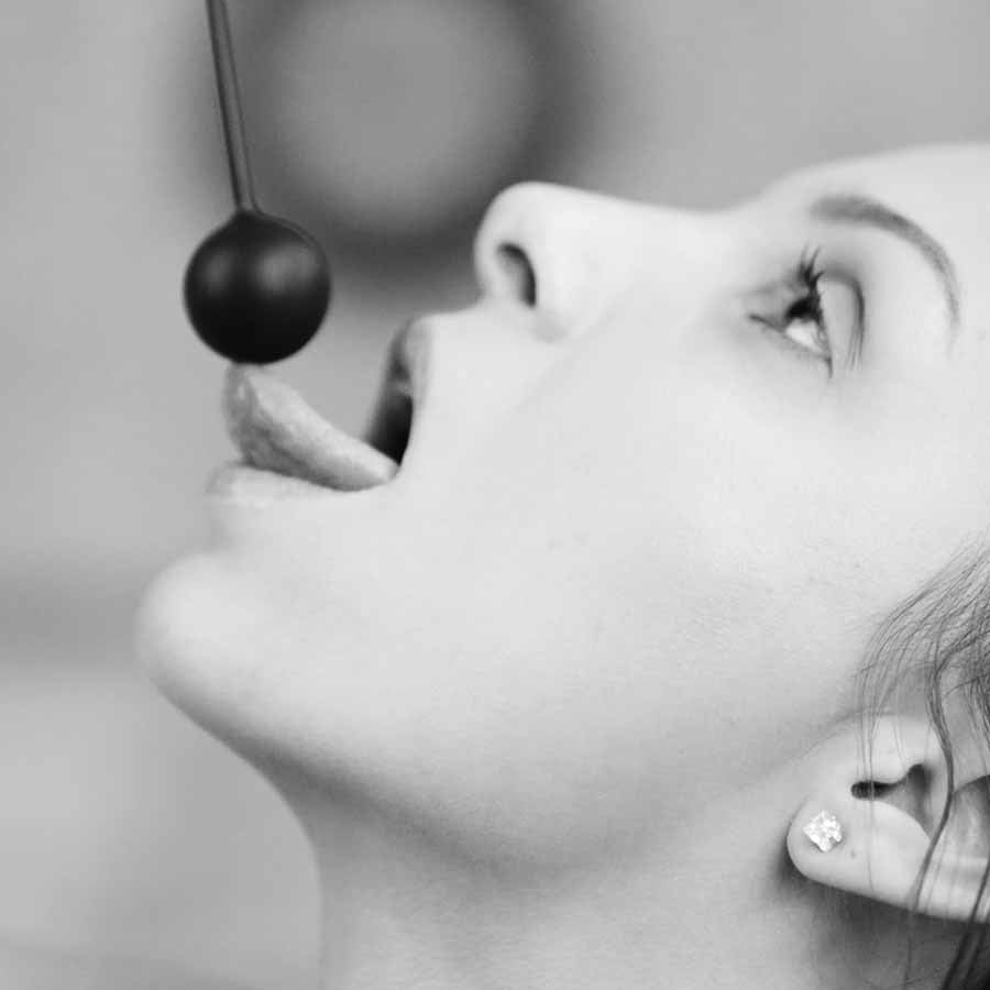 Woman exploring the A-String Toy